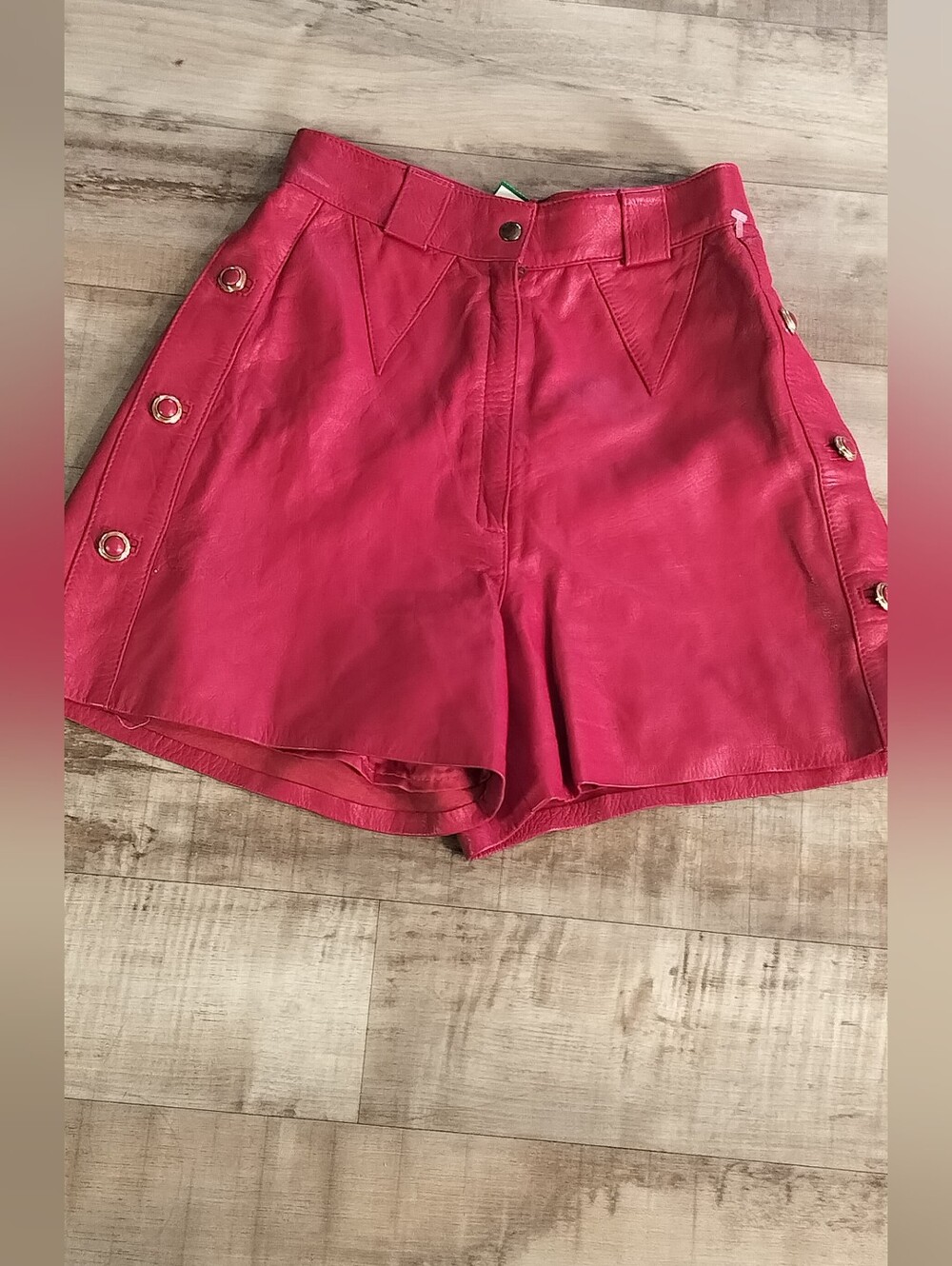 Vera Pelle Pink Faux Leather High-Waist Shorts with Grommet Detail
